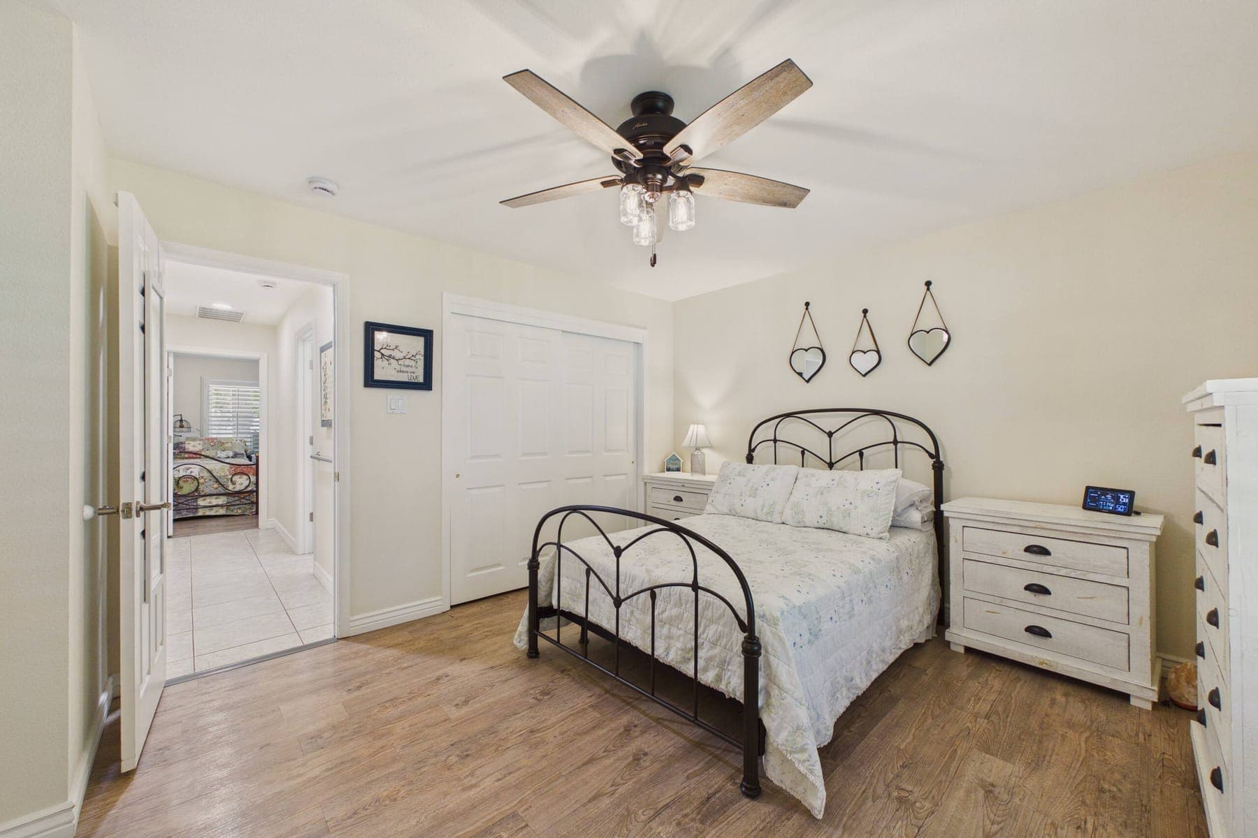 Storage and furnishings in the first bedroom.