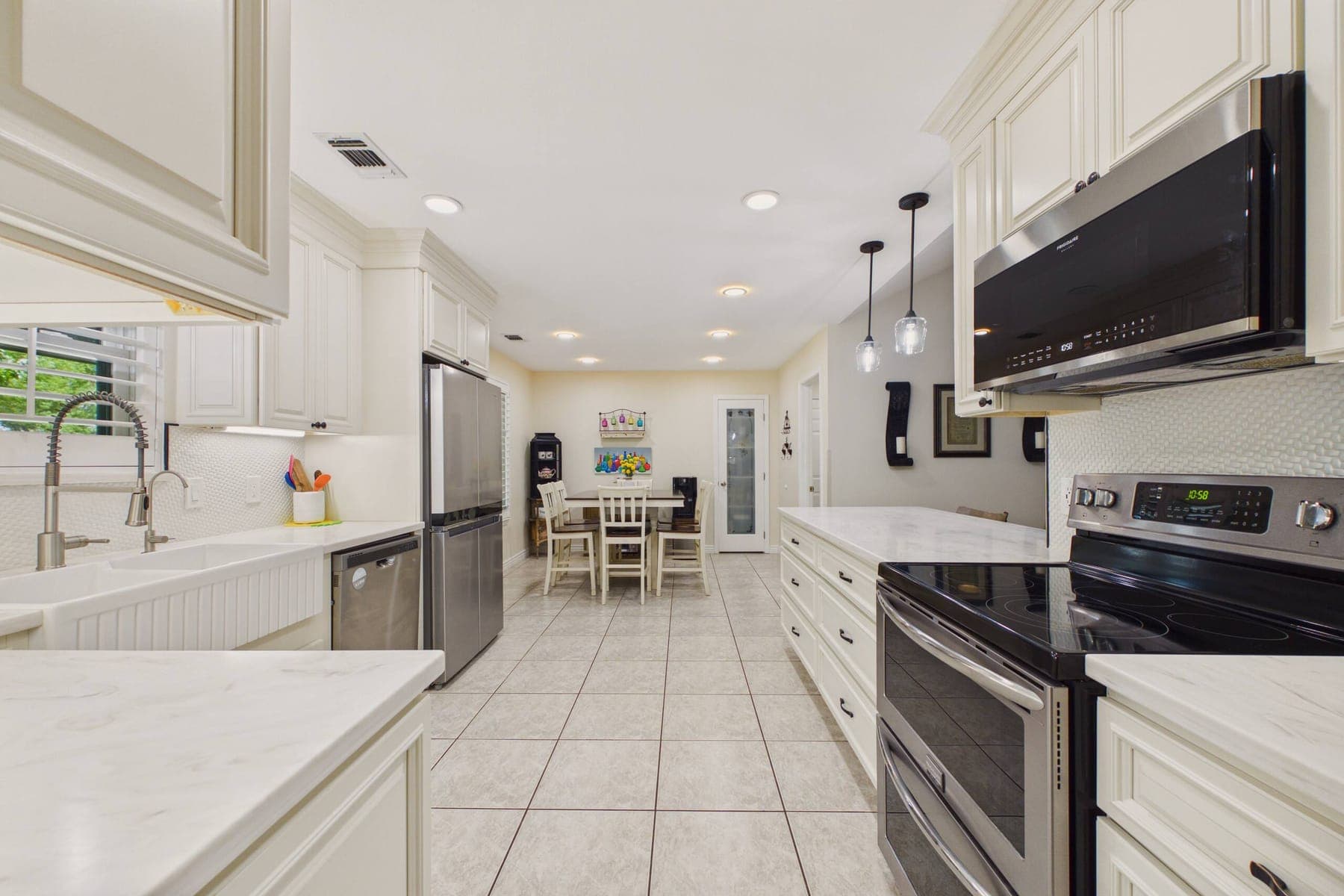 The kitchen countertops and cabinetry.